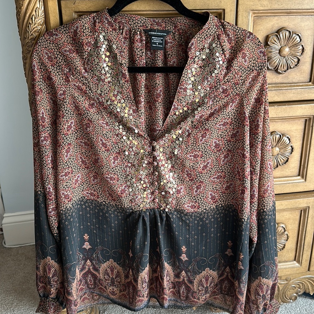 Beautiful Victoria Secret Blouse. Good sequined detailing around the neckline